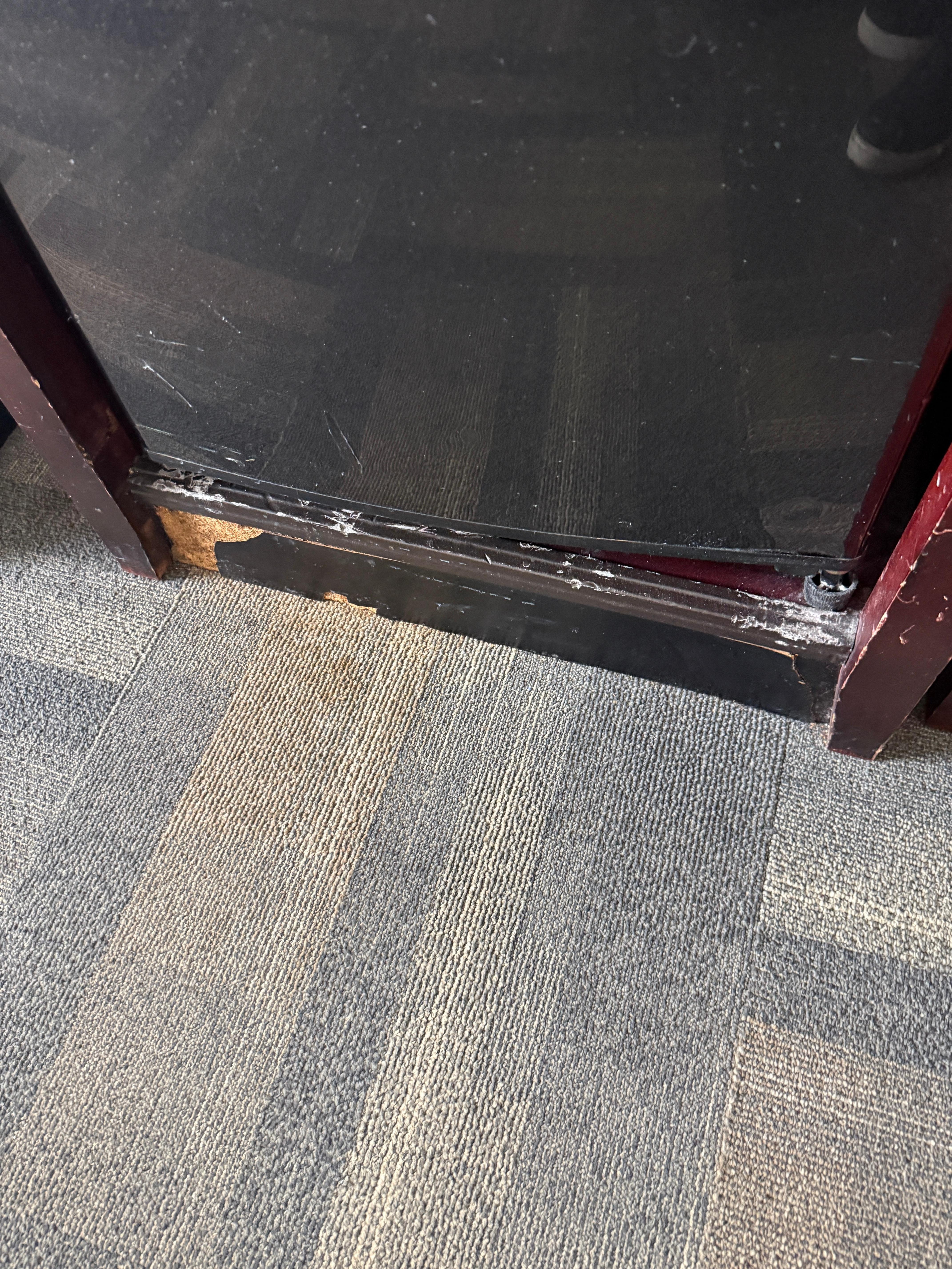 Damage/wear and tear on cabinetry.