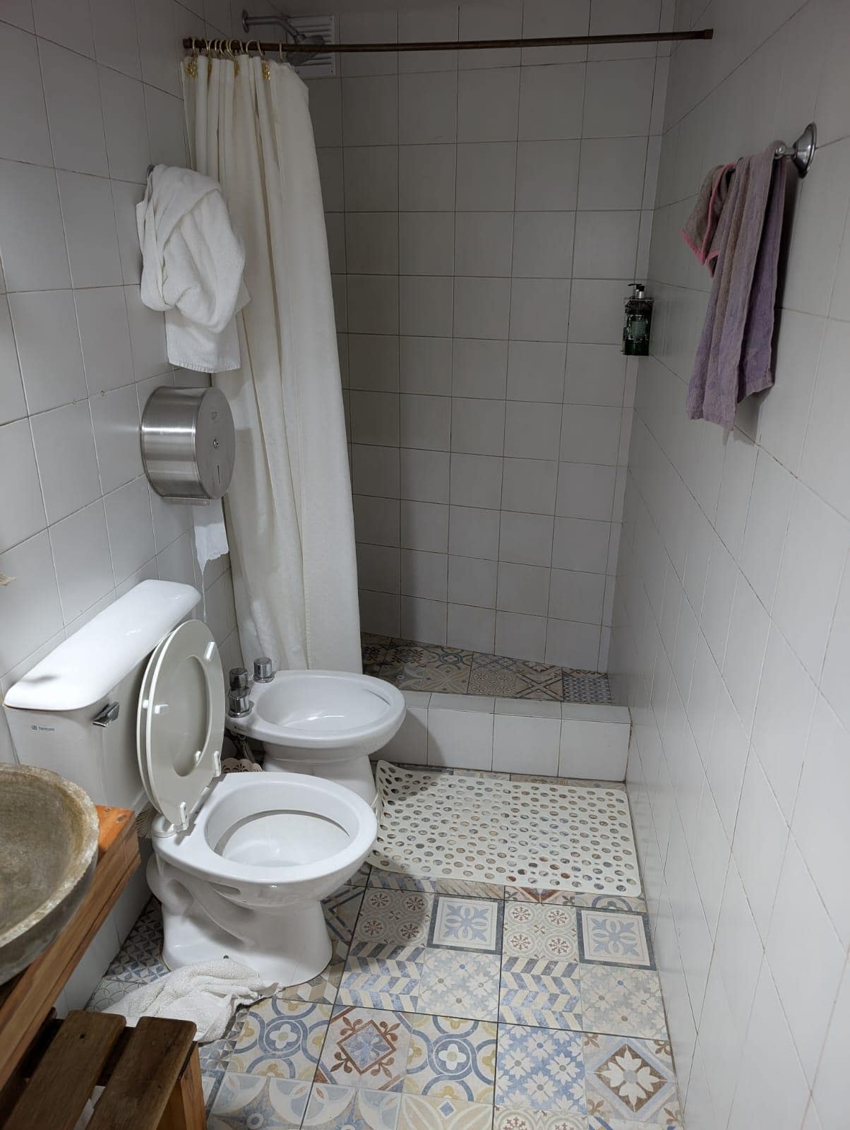 Bathroom not clean, no shelf or hook for clothing.very damp, no ventilation 