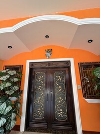 The entrance of this spotless hotel.