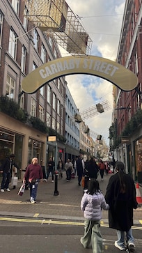 Extremely close to shops, bars and restaurants.