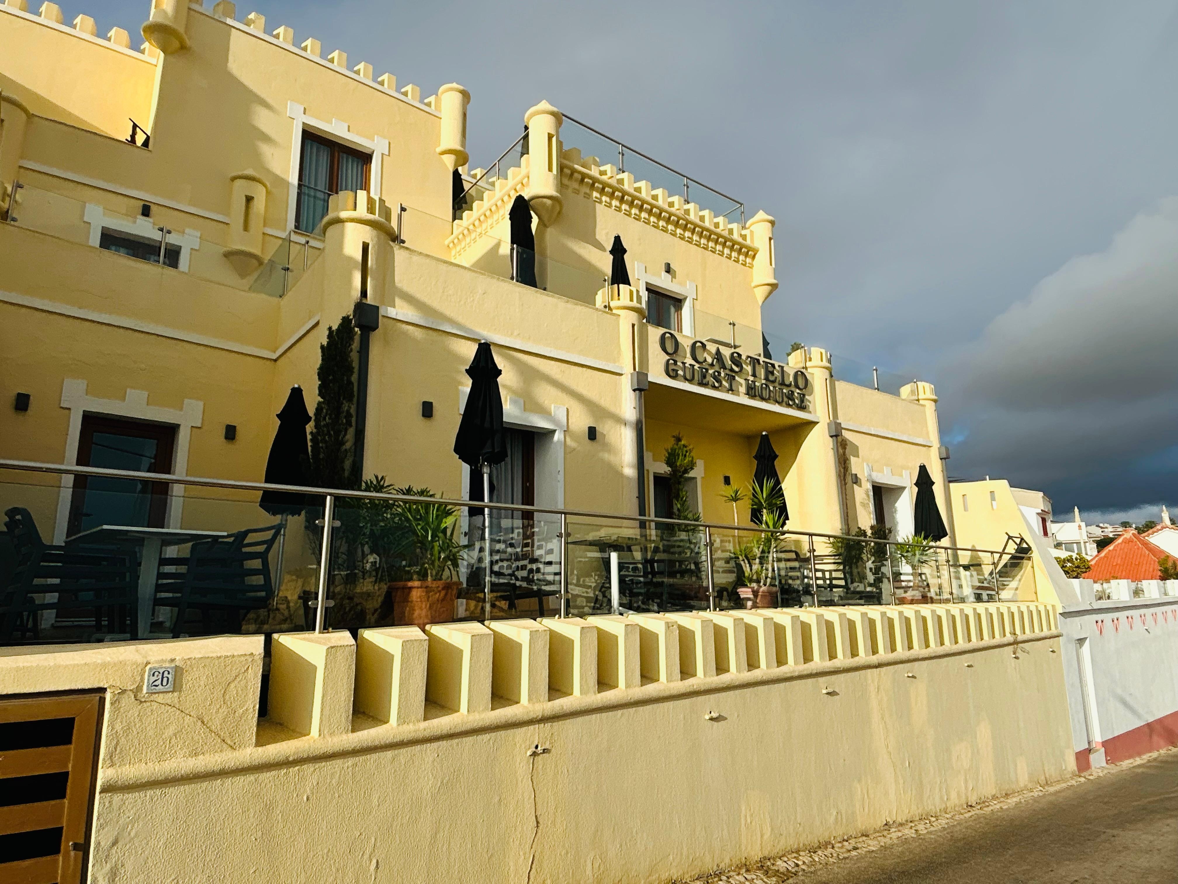 Exterior of the guesthouse facing the ocean. 