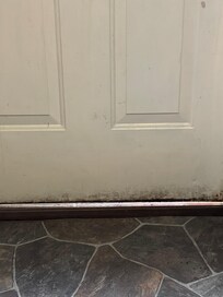 Space under the door for draft