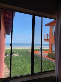 This is the view from our bed! The sound of the ocean was so gentle and nice.