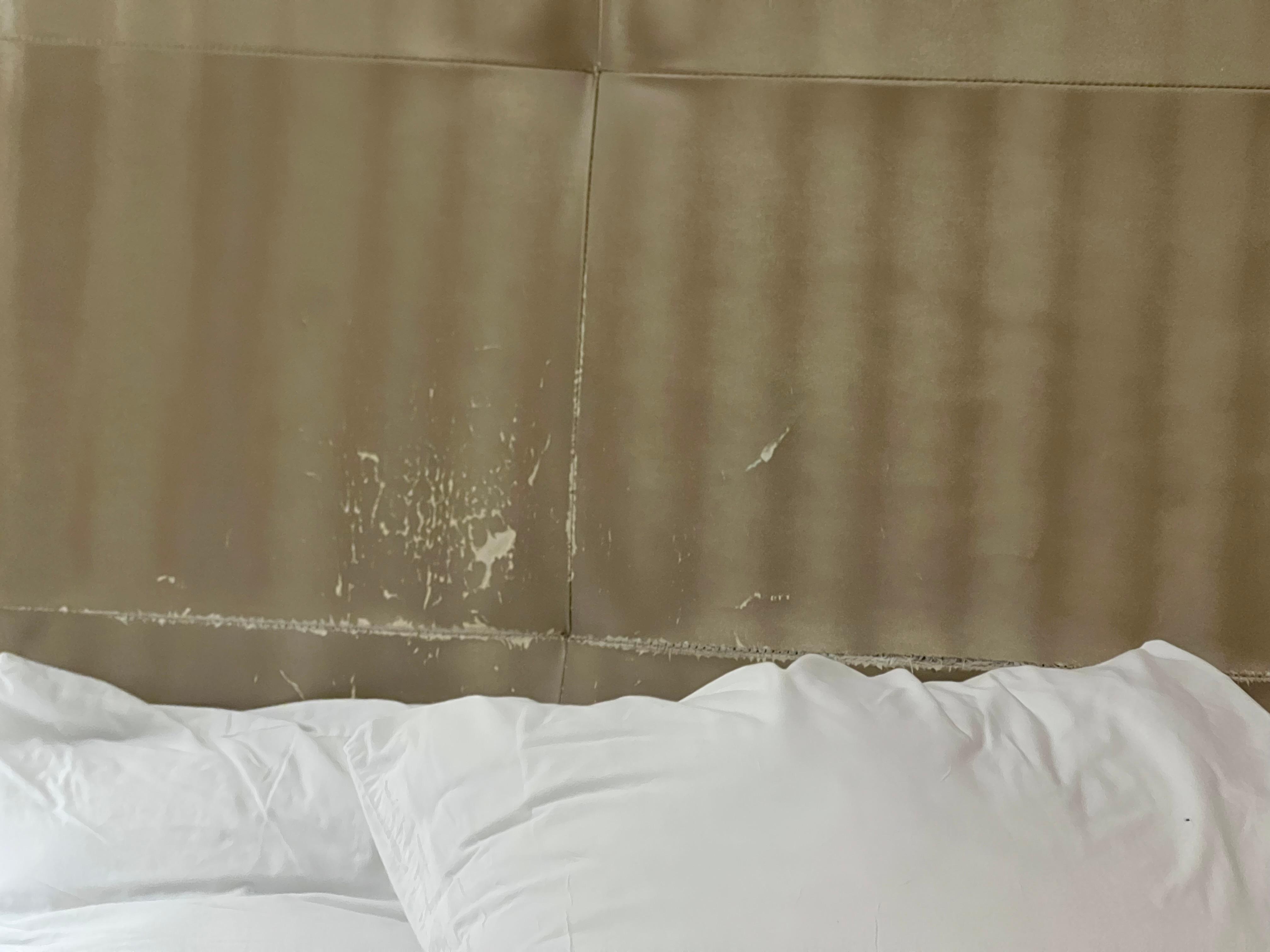 Damaged headboard -both beds in room 726