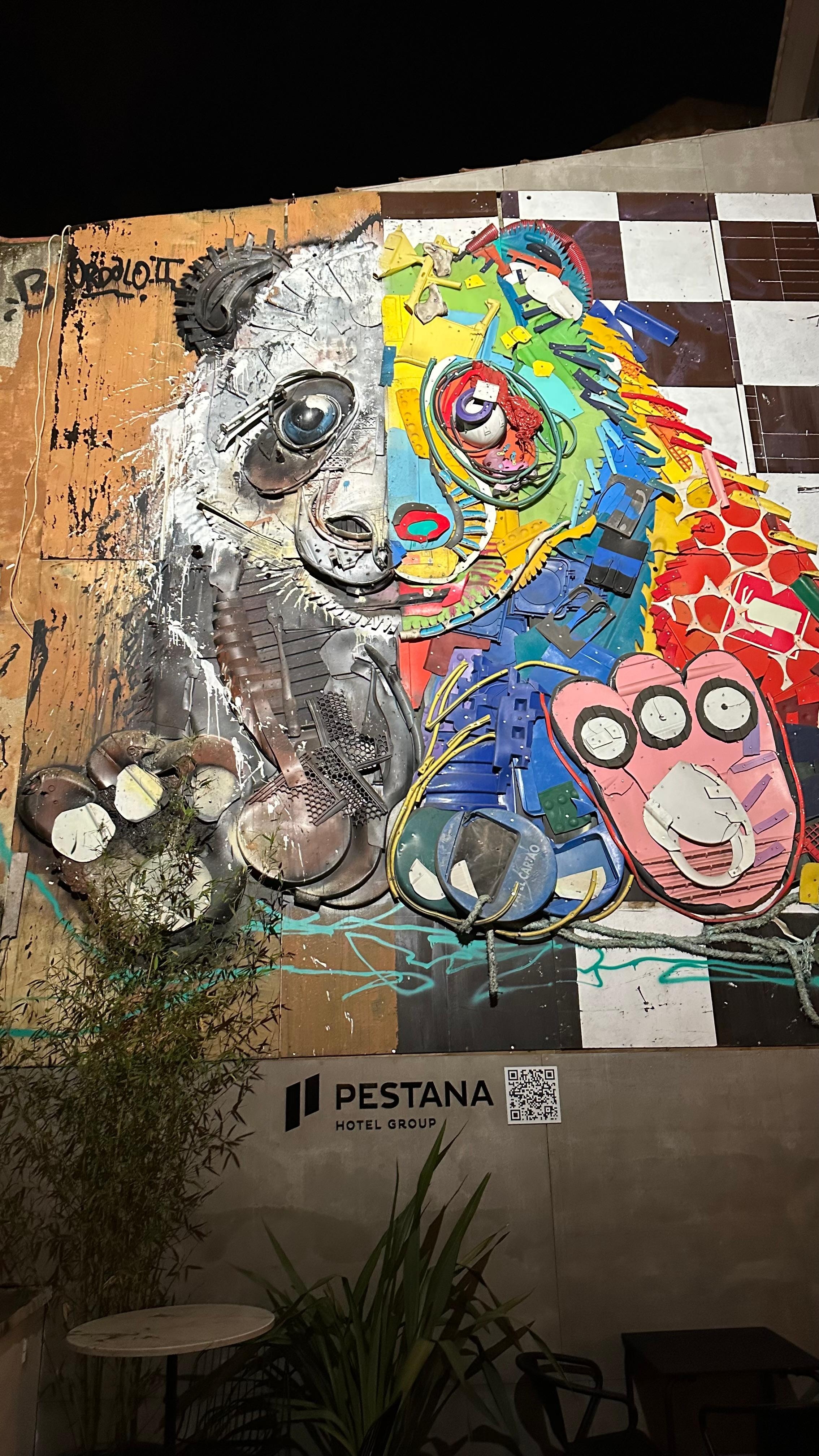 Recycled Art piece flanks the entrance from a popular Portuguese artist