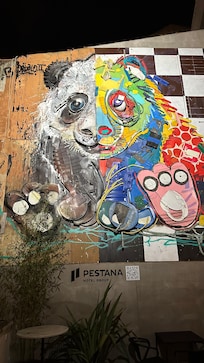 Recycled Art piece flanks the entrance from a popular Portuguese artist