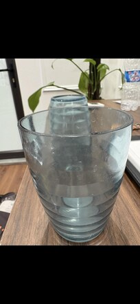 Toothpaste still on glasses from previous guests.