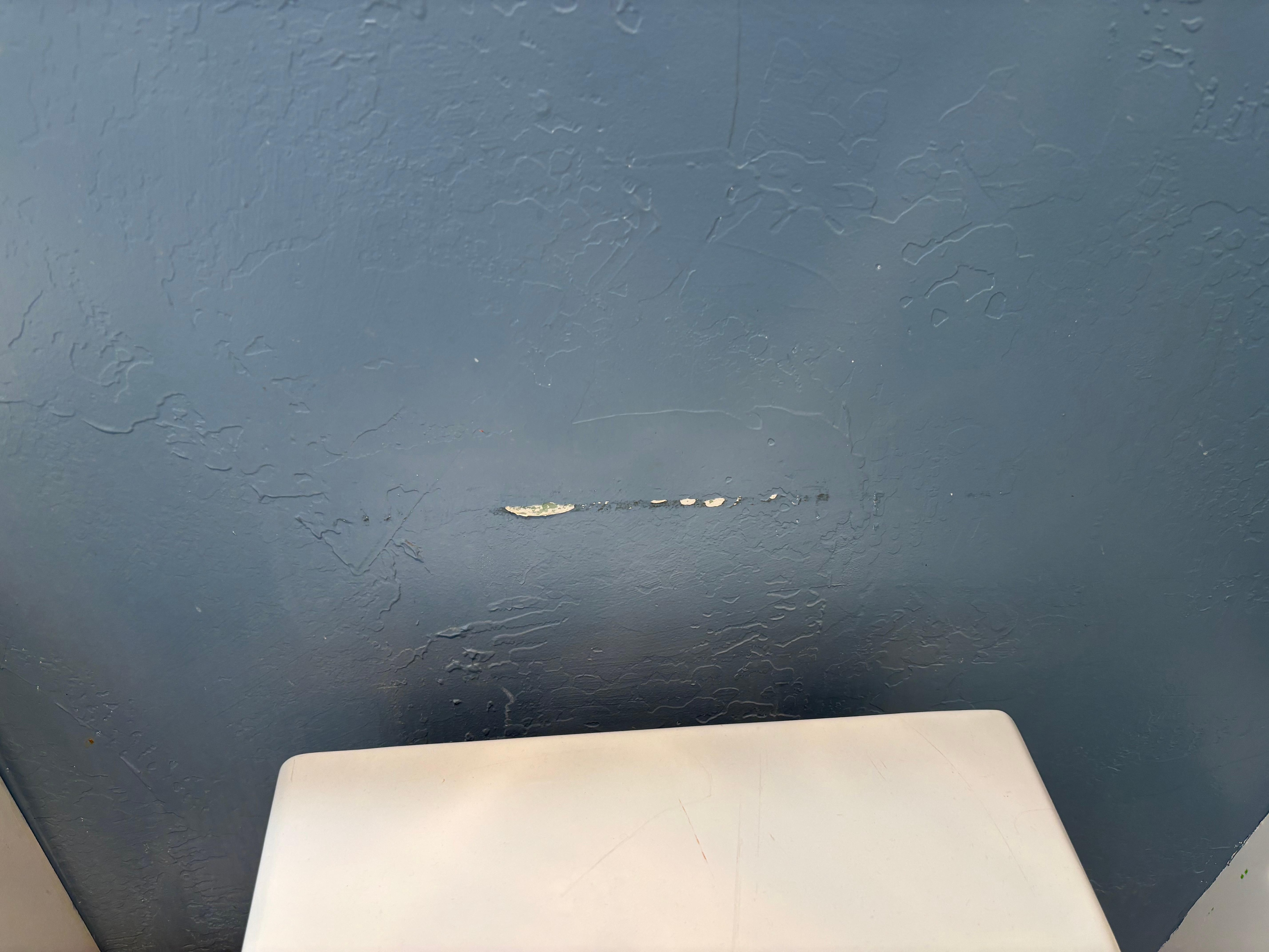 Typical scrape found all over the condo