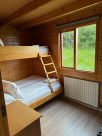 Downstairs rooms with comfortable bunk beds. (Loft upstairs)