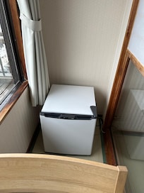 Balcony area with fridge
