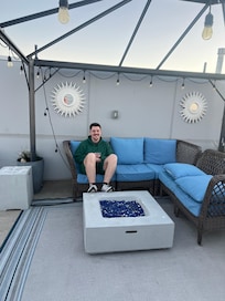 Rooftop patio fire pit area