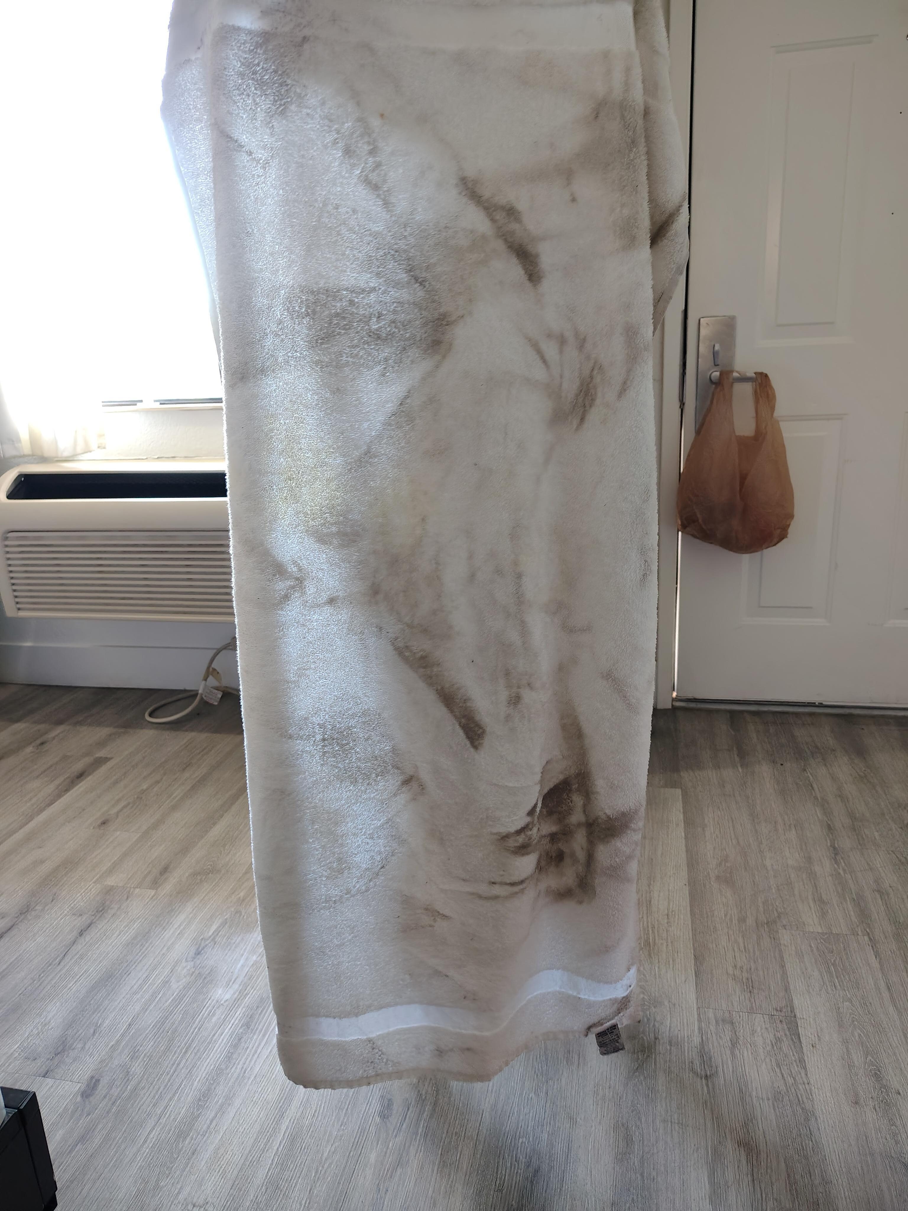 My son went swimming and I put the towel on the floor and this is how dirty the floor was.