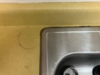 Stained and crumbling counter