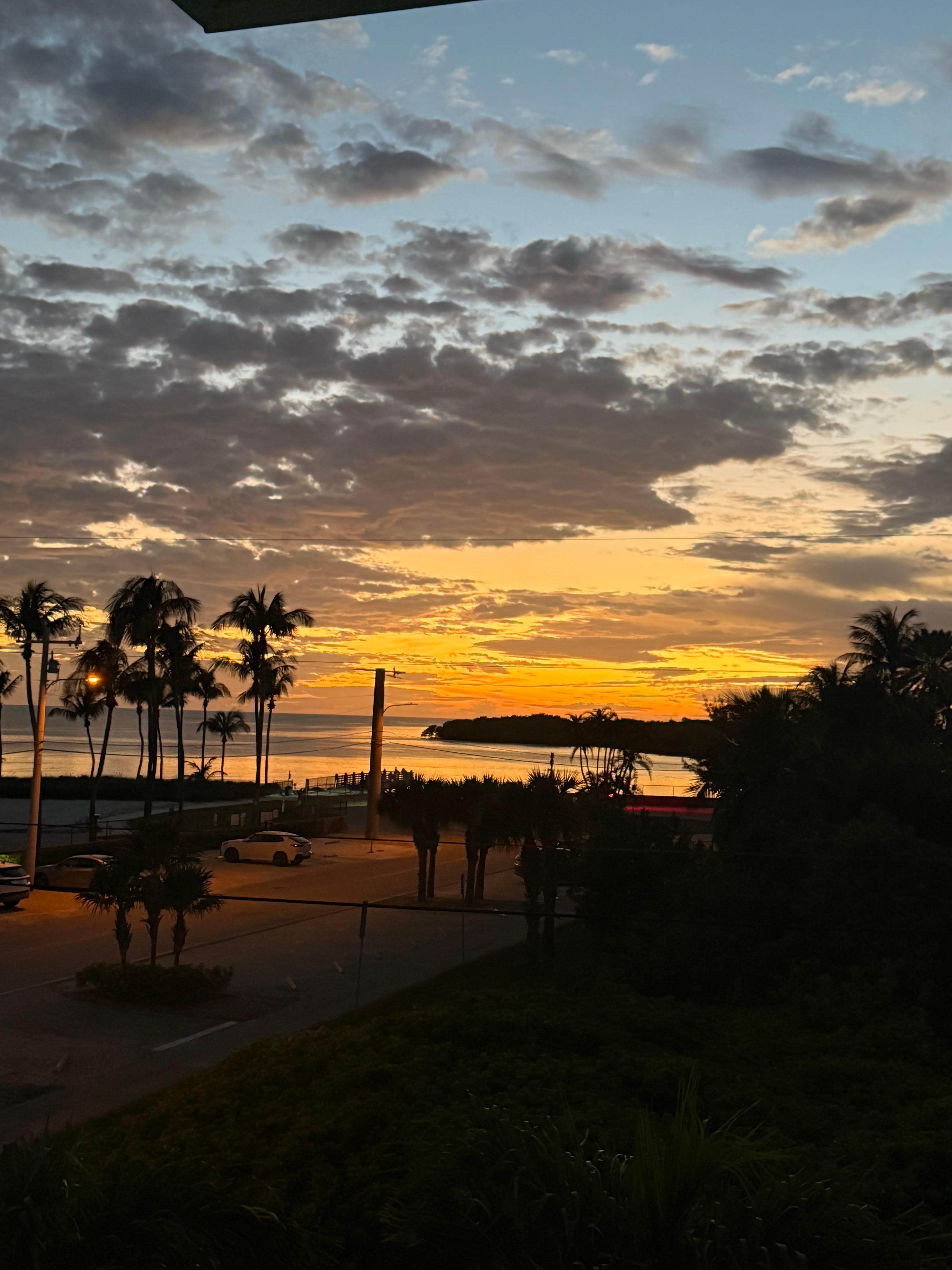 Sunset views from the balcony upstairs off our room.