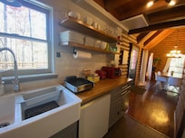 Partial kitchen with view to dining area