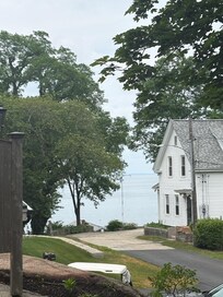 View of sea from cottage parking.