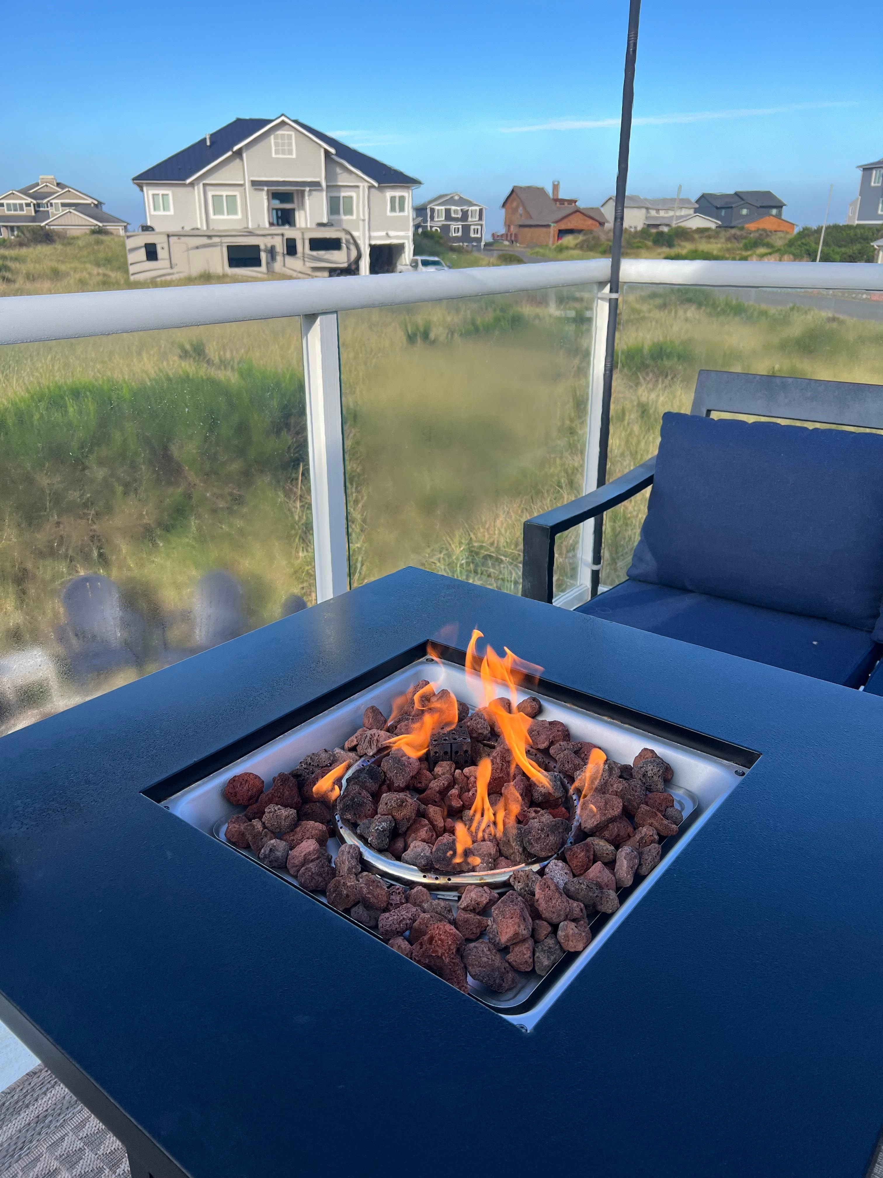 Enjoying the morning sun and ocean waves on the upstairs deck. 