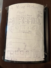 The history of the cottage, compiled by young members of the owner’s family.