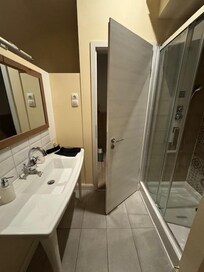 You enter right into the bathroom, which was a little weird, but fine, since the toilet is separate with a door.