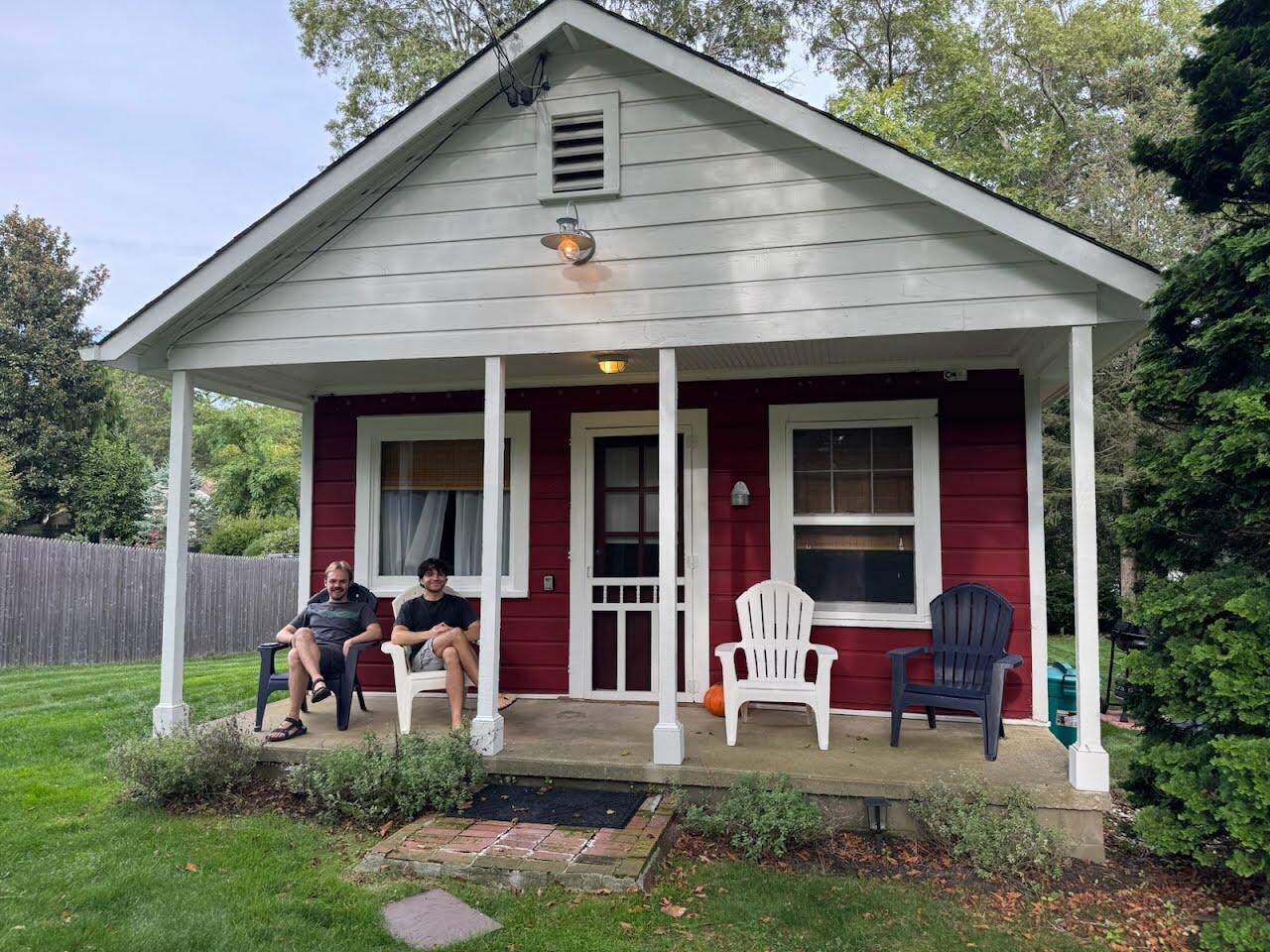 "So, ..When is dinner?"
Young Men at The Little Red Cottage; formerly
General Store.  Built 1947.
(~HSorger)