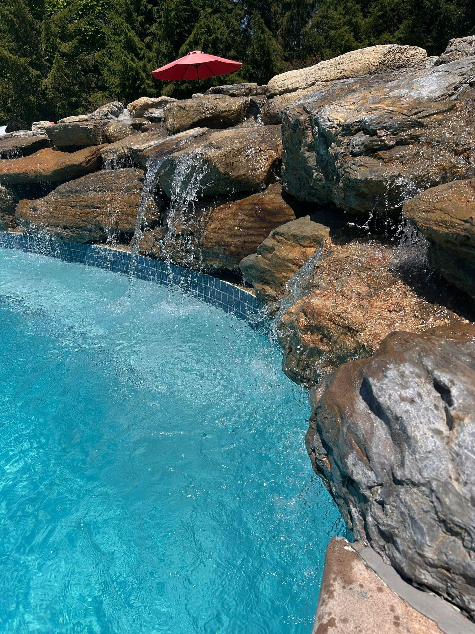 Rock water fall at the poolside
