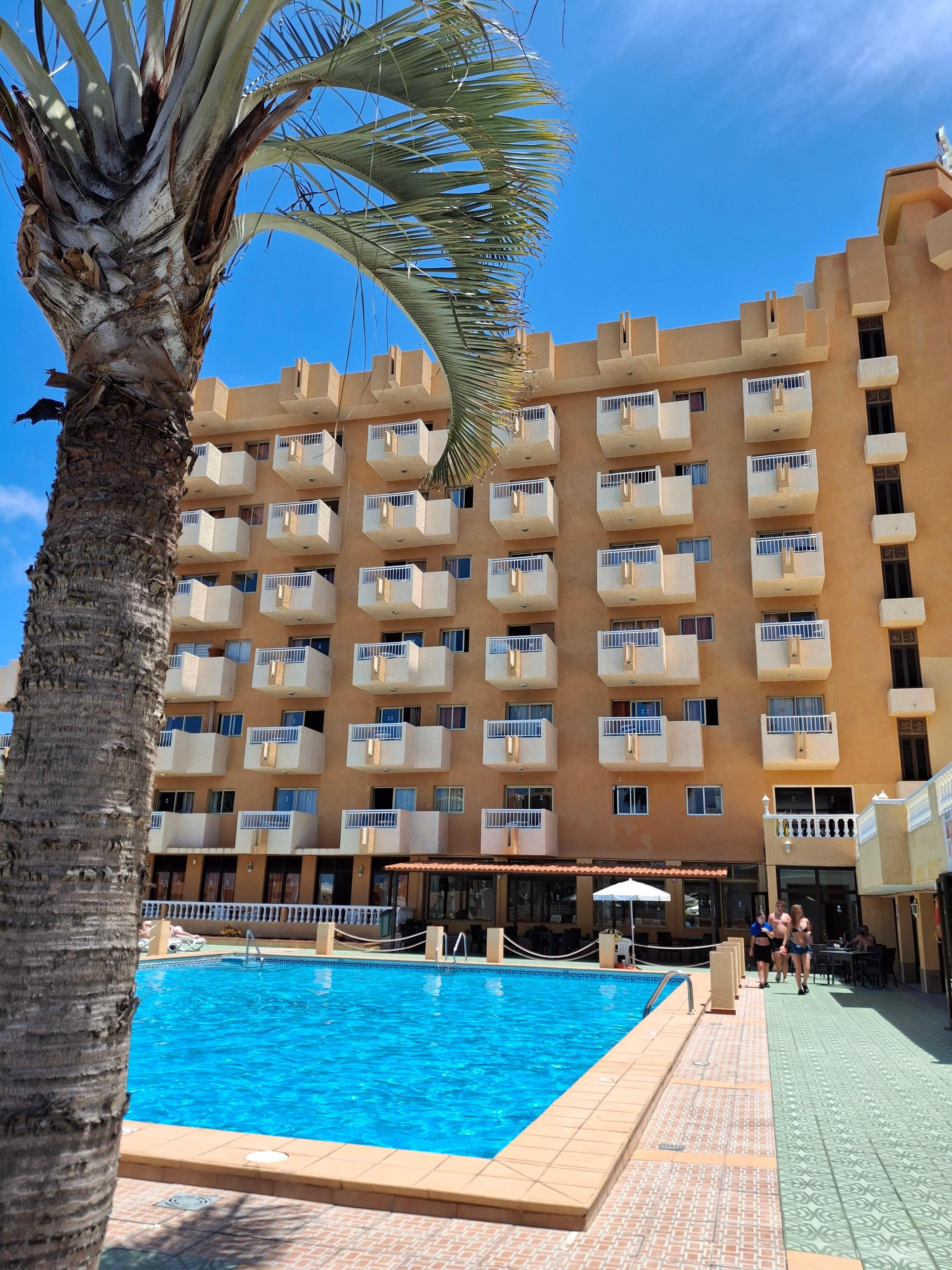 Part of the hotel from the pool area.