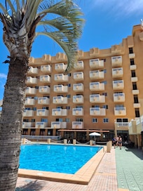 Part of the hotel from the pool area.