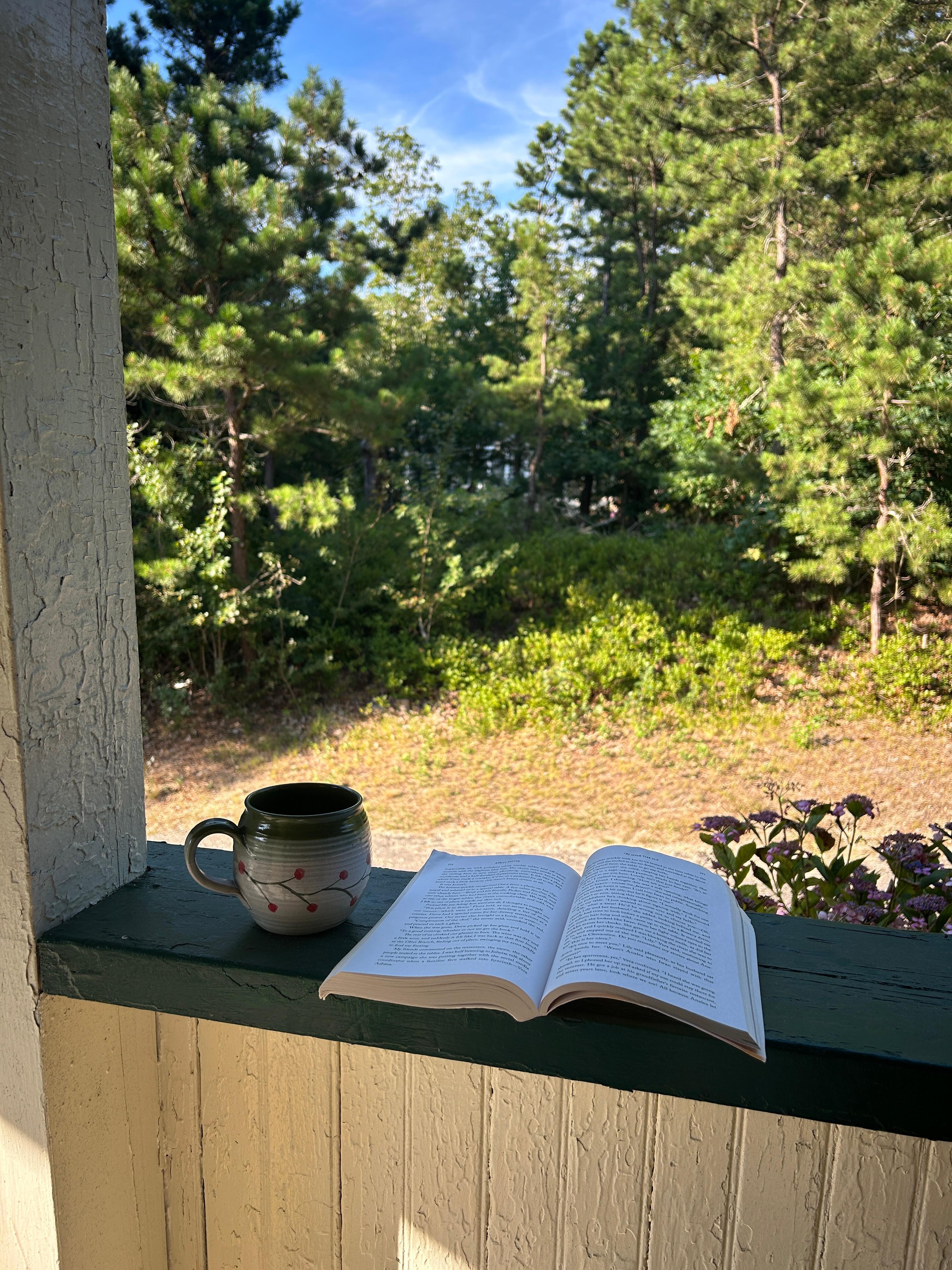 Enjoying coffee on the wrap around porch. 