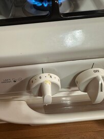 Food on stove knobs.