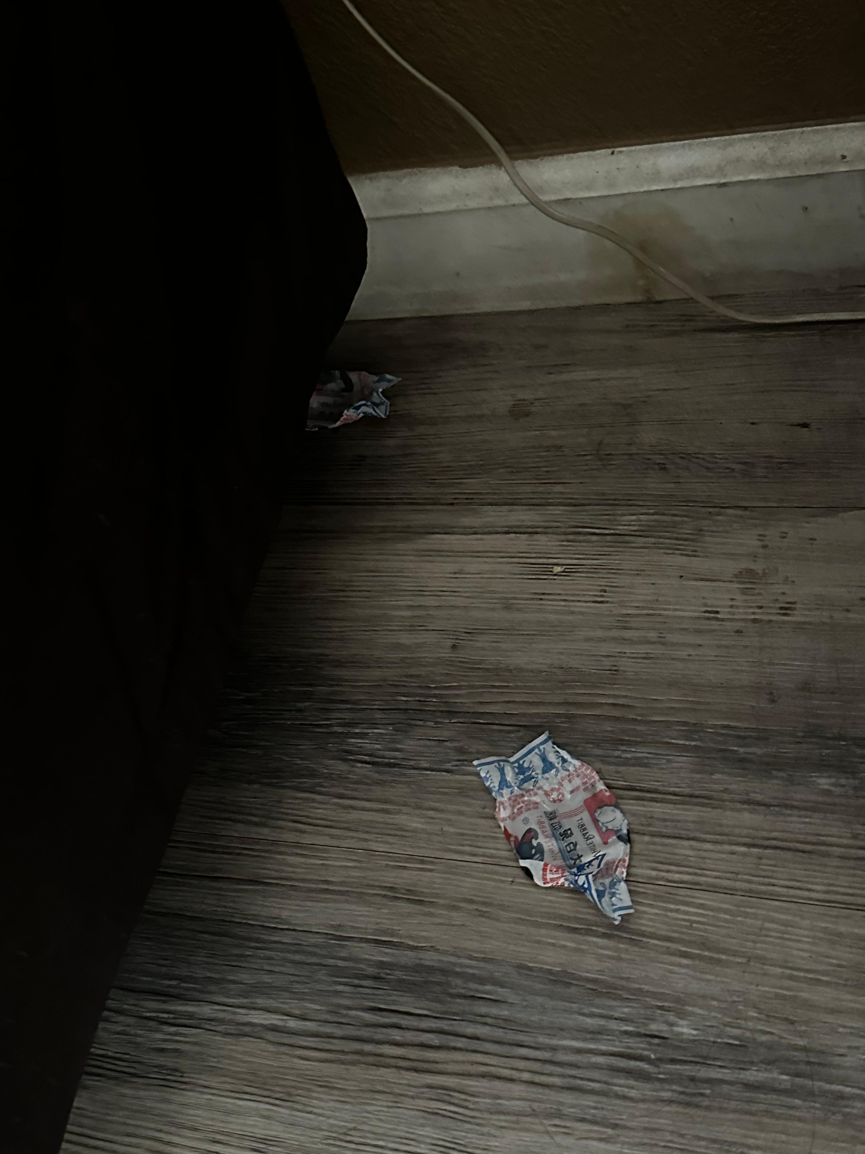 Candy wraps on the floor 