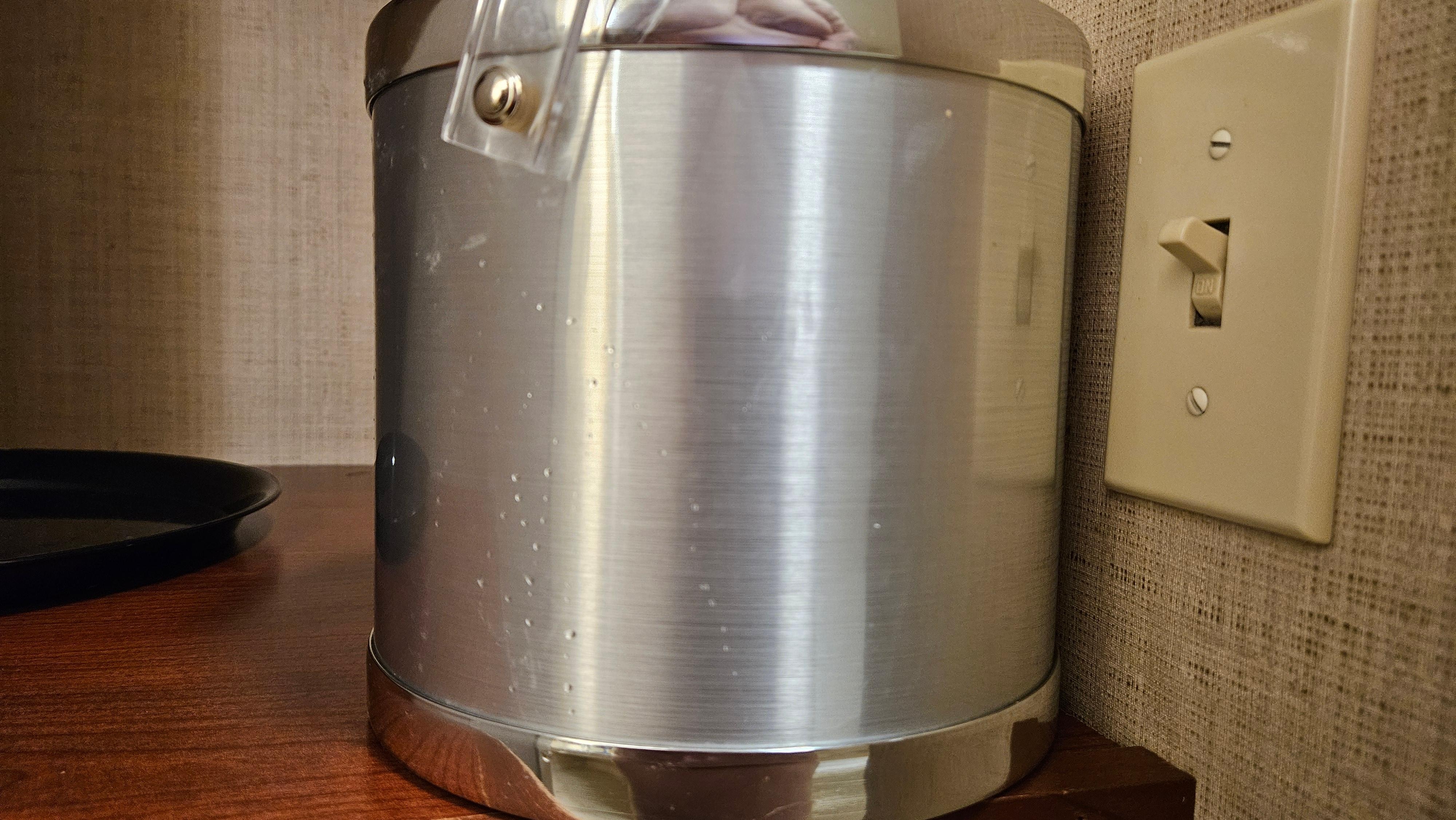 The ice bucket was sticky and wet. 