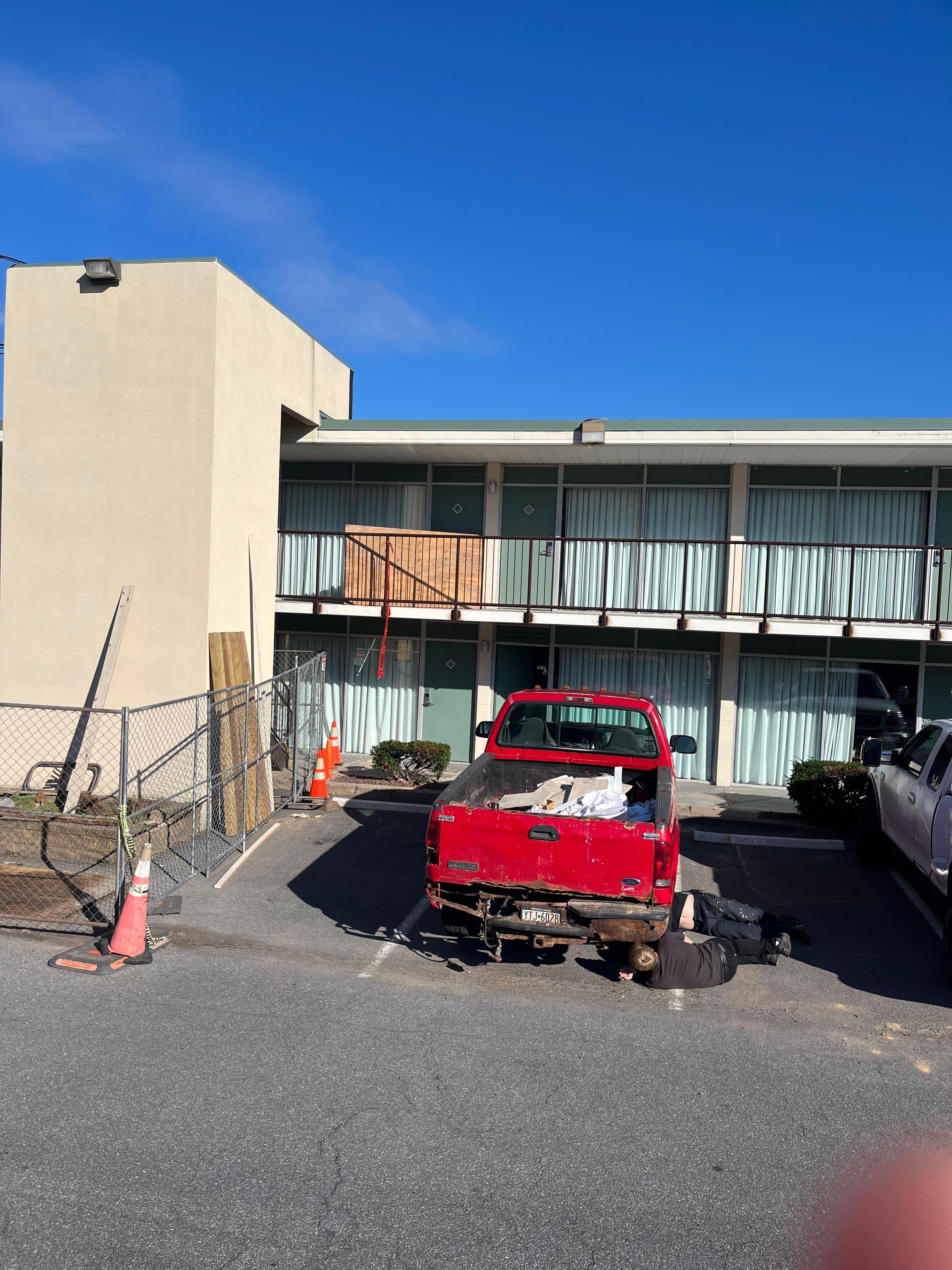 Abandoned truck outside our room. This place is disgusting