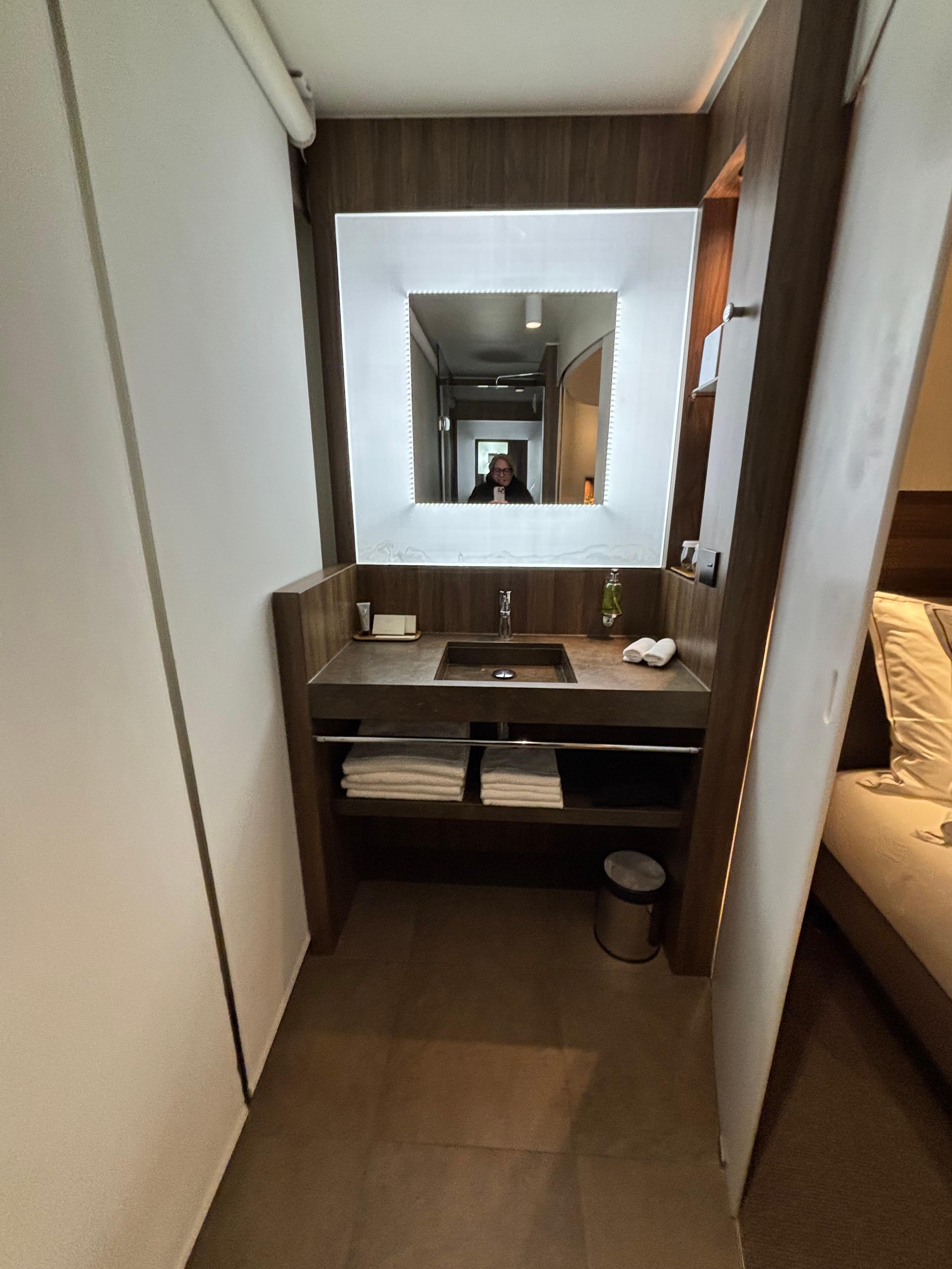 Sink across from shower