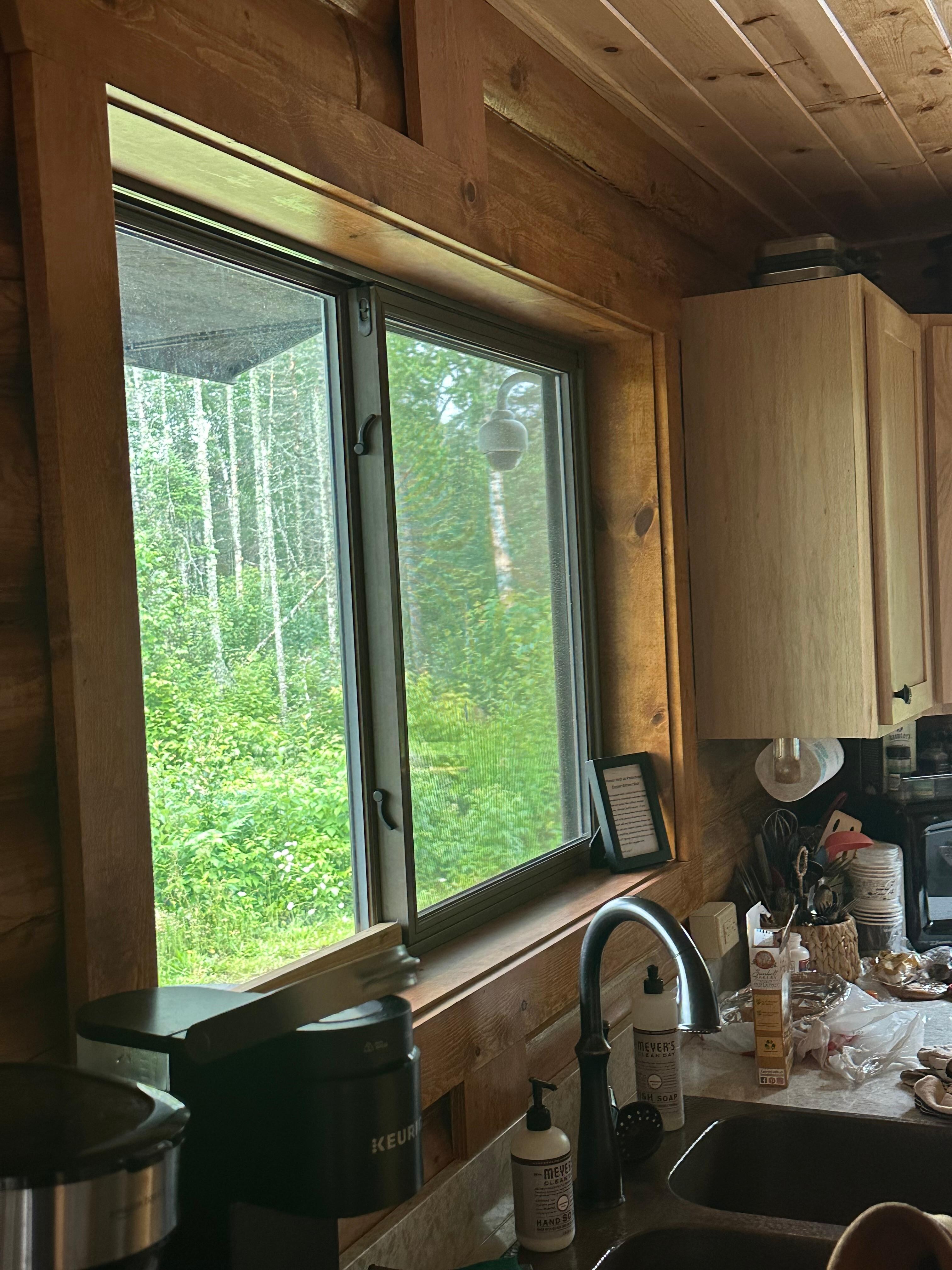 Camera right outside the window clearly line of sight of inside.