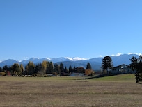 Sweeping views of the Olympics from the property.