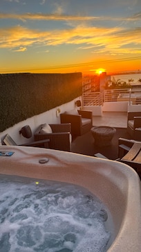 Stunning sunsets from the private rooftop jacuzzi.