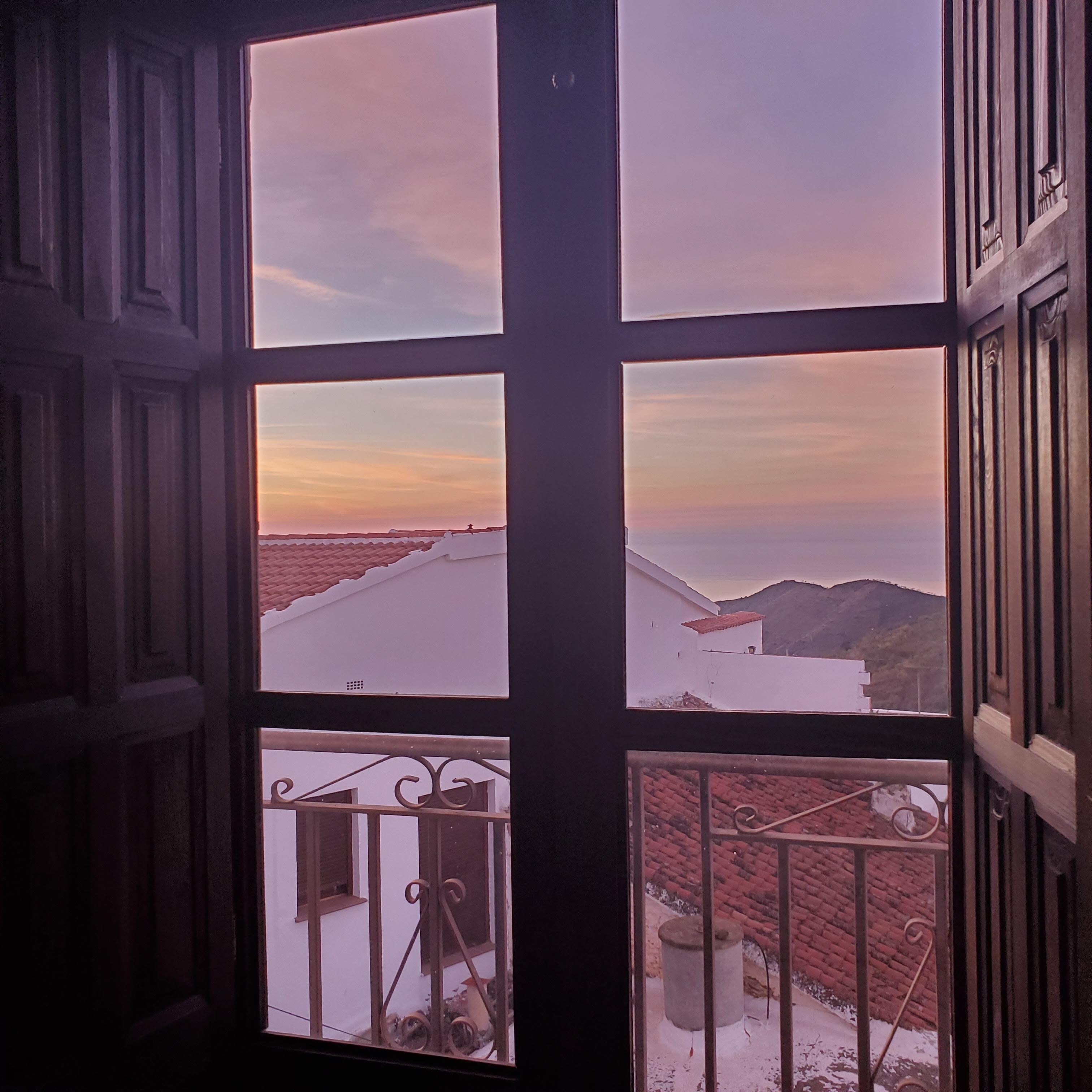 Watching the sunrise from the bed! 