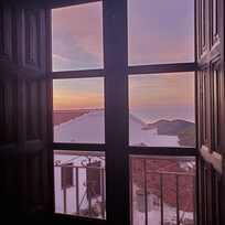 Watching the sunrise from the bed!