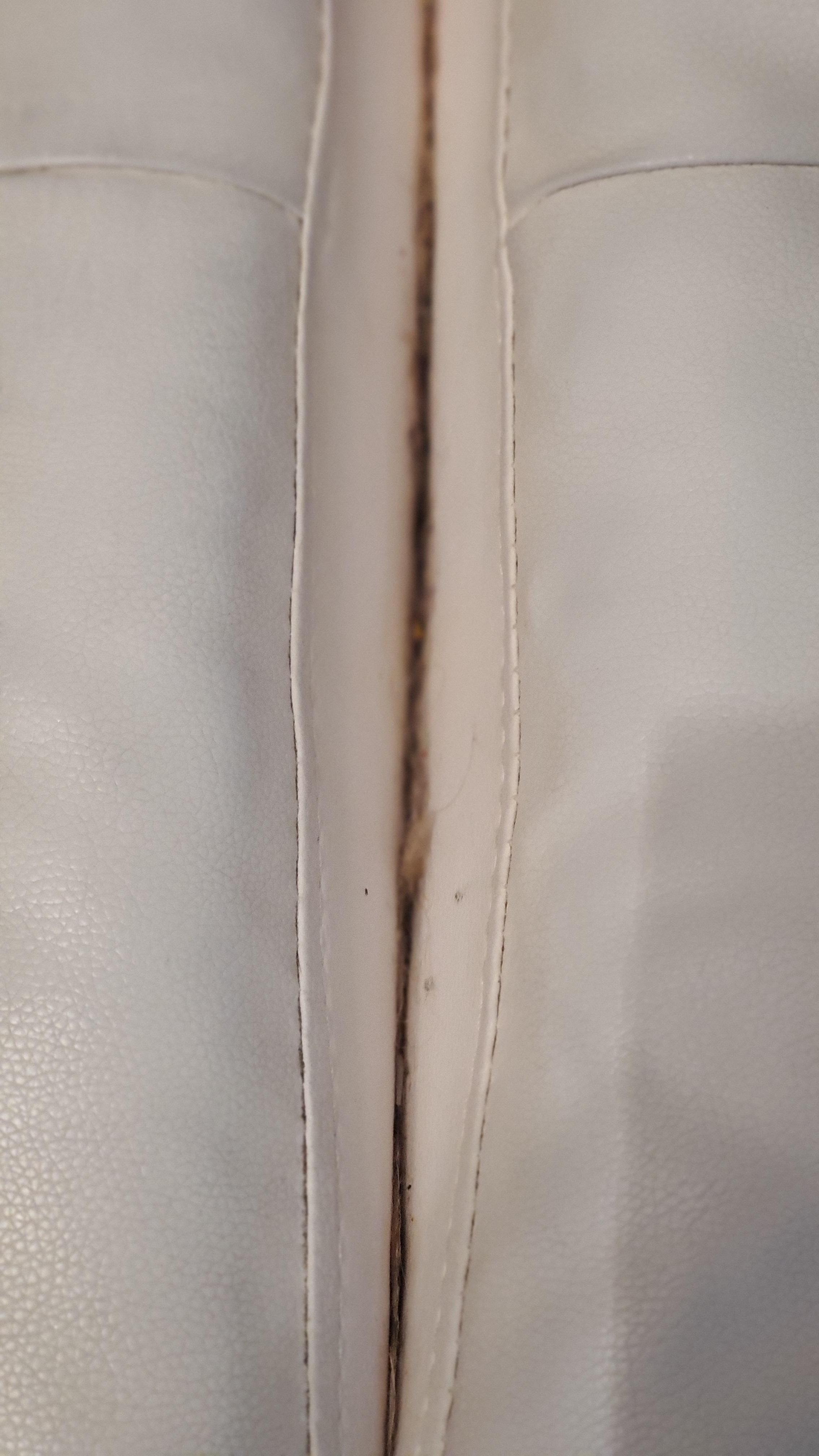 Between cushions on futon