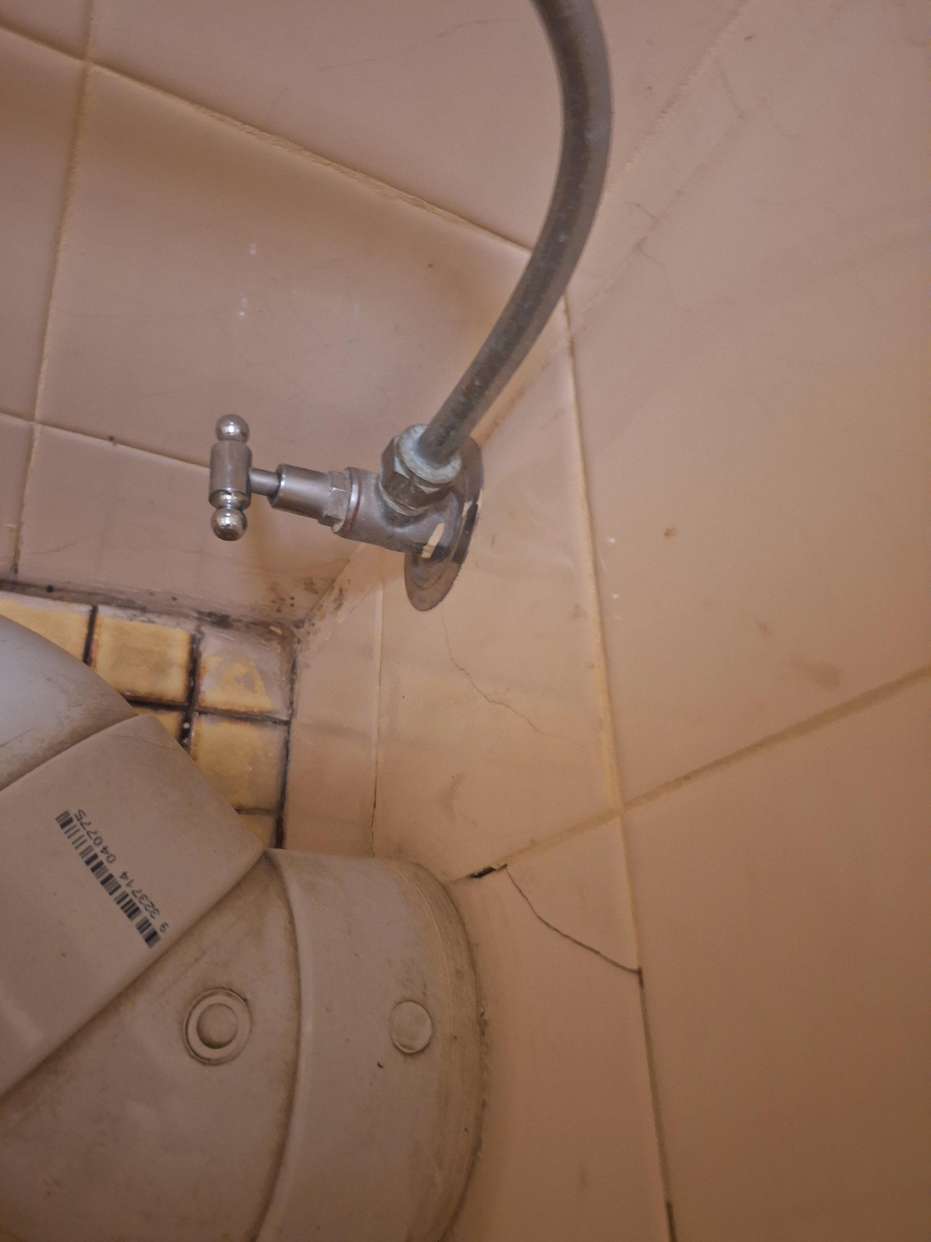 Leaking water from wall and could not use toilet unless turning off. Then turn on to use toilet. 