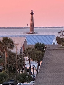 MOrris island light house with Sullivan island lighthouse in background.