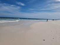Beach is beautiful and 100% coral so cool to walk on.