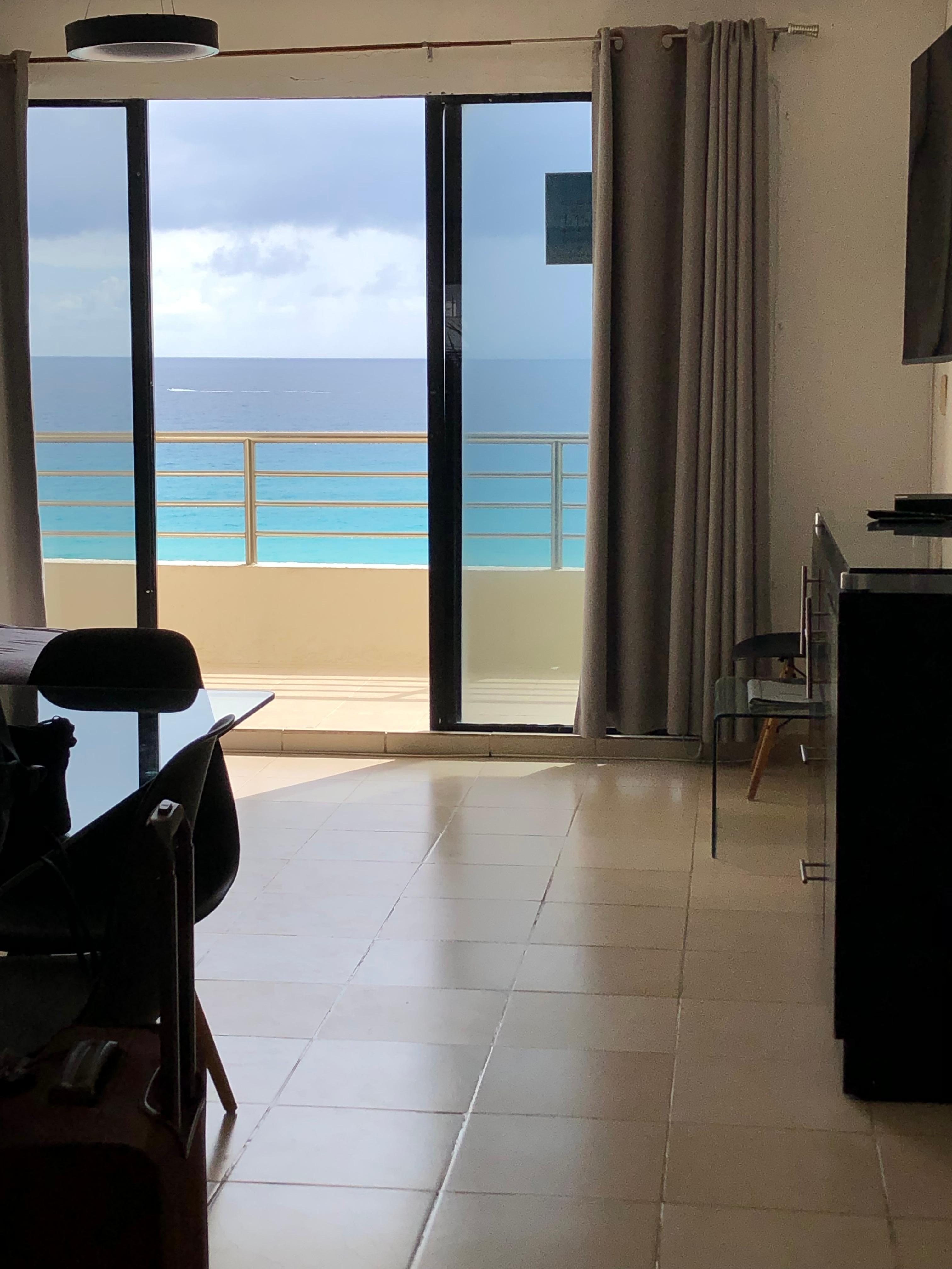 Balcony overlooks top of villas so you have to strategically sit for the incredible view. 