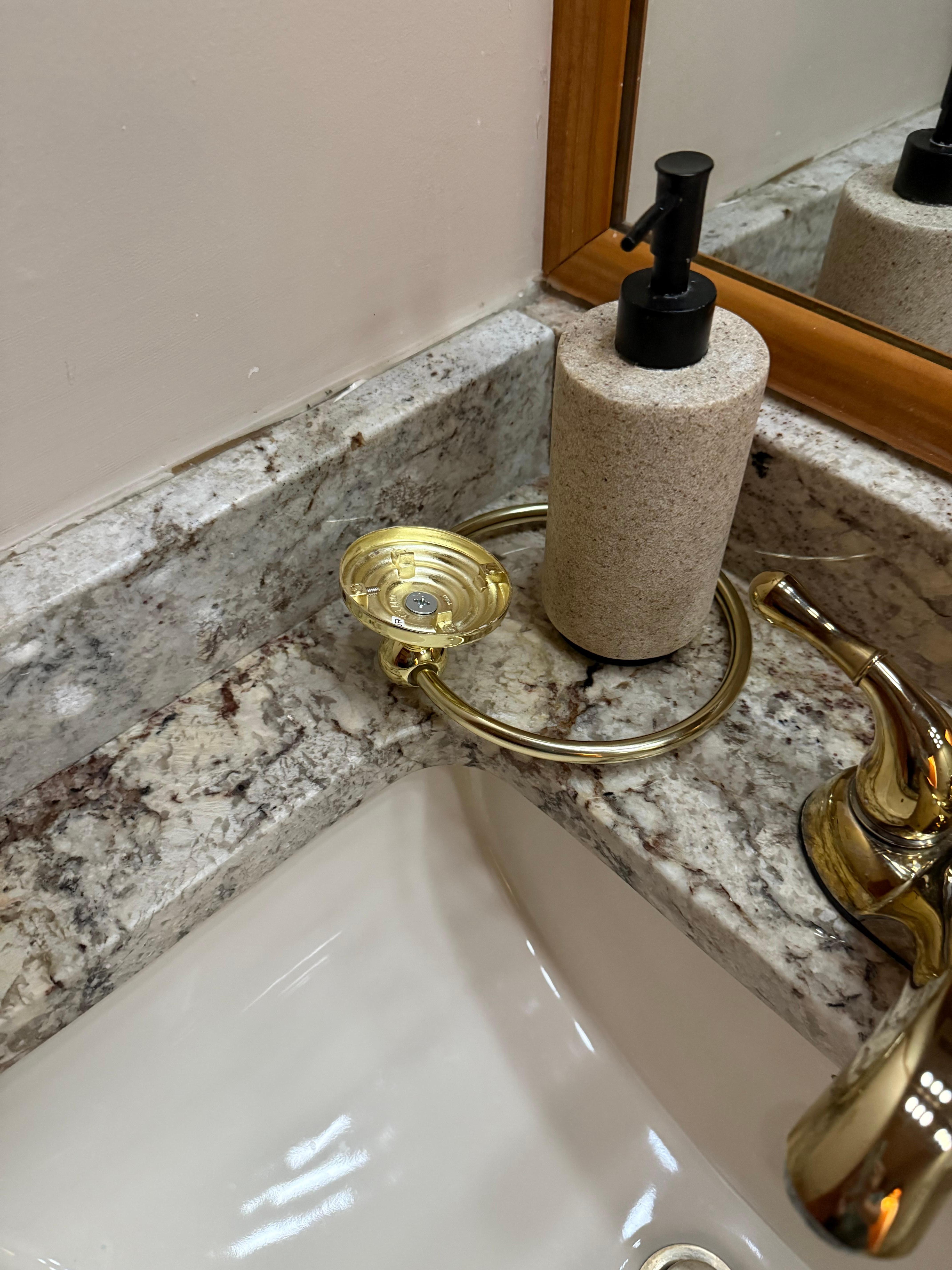 The towel ring was off the wall