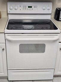 Stove has 2 cracked burners on the right side, guess I'm only cooking on the left. It's a shame I'm not left handed.