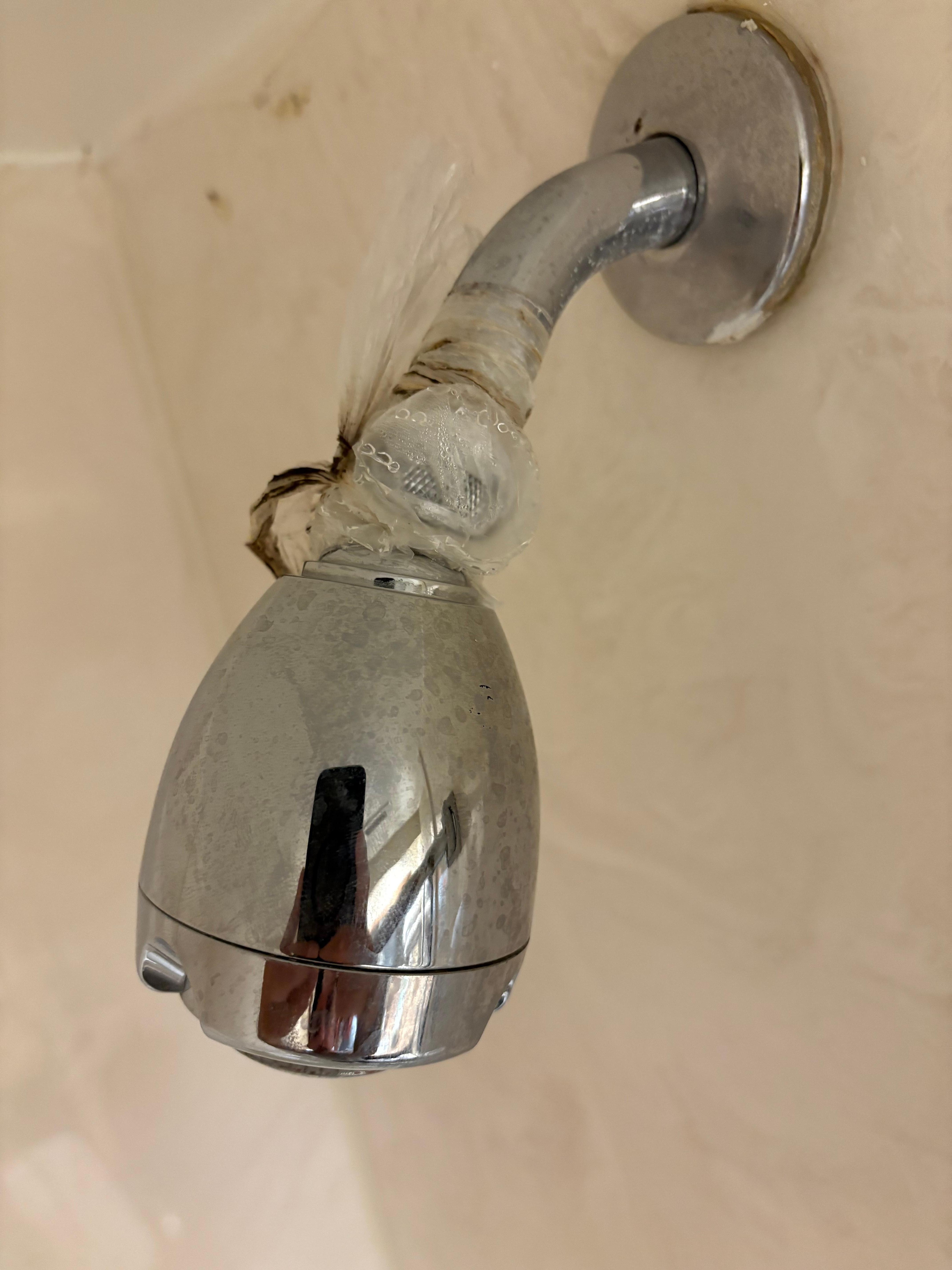 Shower head water leak with plastic bag
