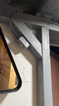 It took a bit of searching in the dark to find the basement level light switch tucked up to the right of the lower entrance.