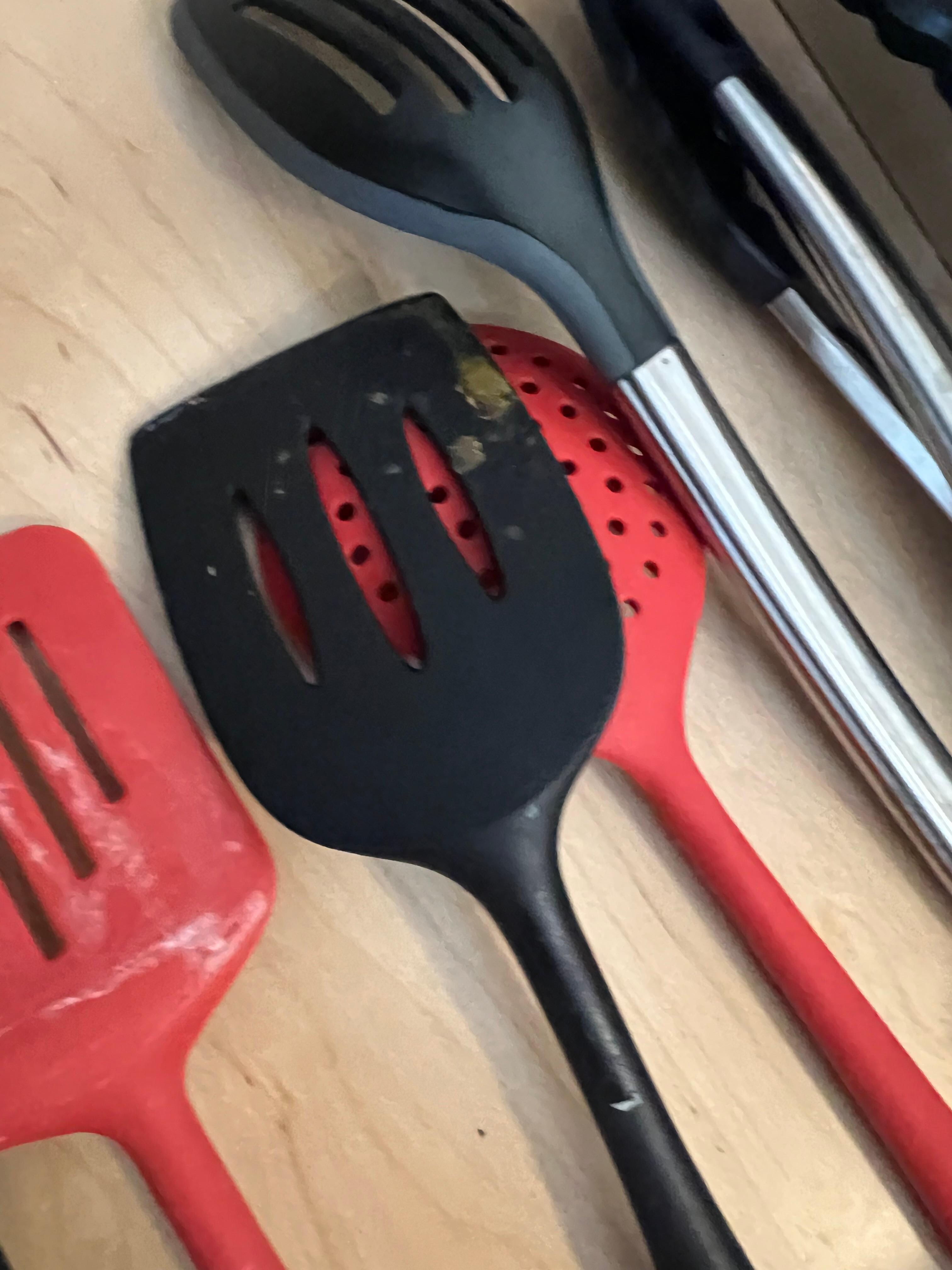 Hard dried food on spatula 