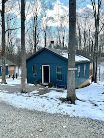 The little blue cabin in the woods