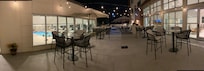Left is pool, patio right is lobby/sitting area
